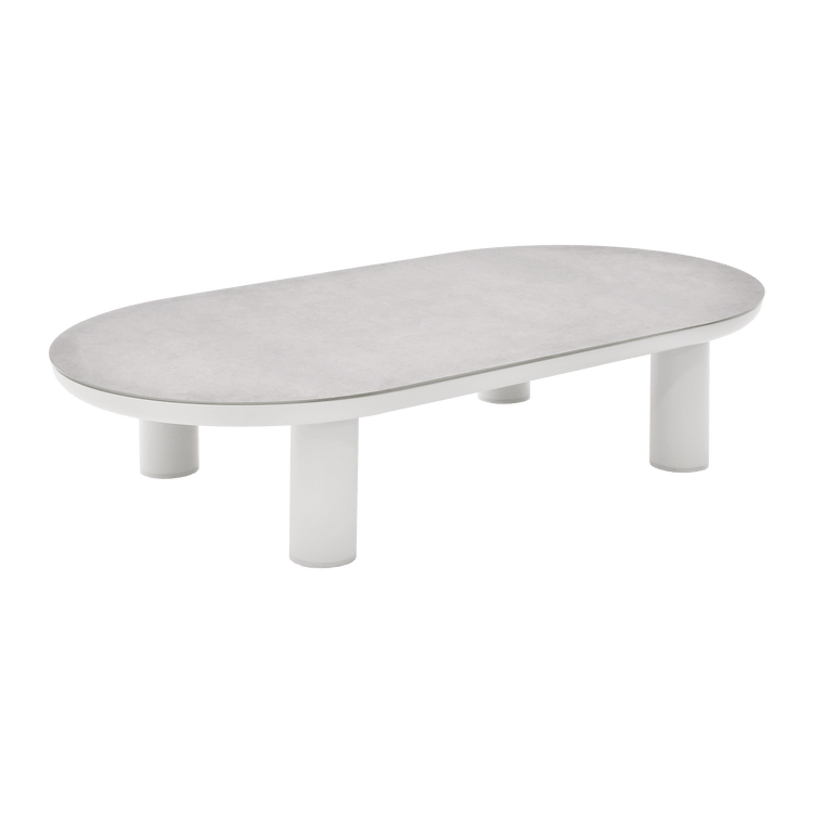Low oval table has a pale mottled top and several short cylindrical legs