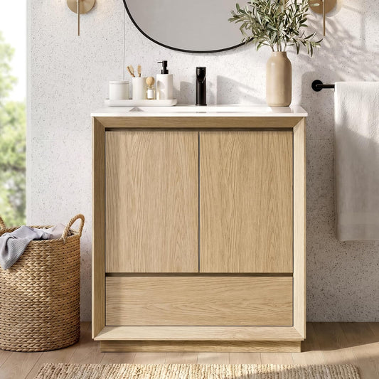 Light wood-look vanity with two doors and a wide lower drawer