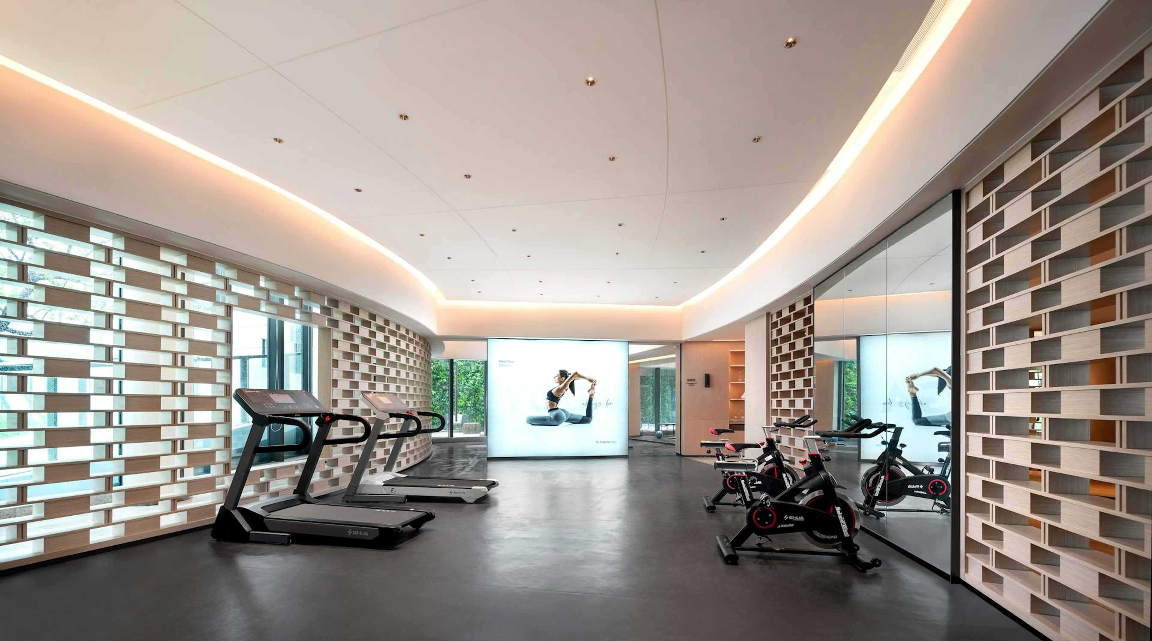 Athlete training hard in a dark gym