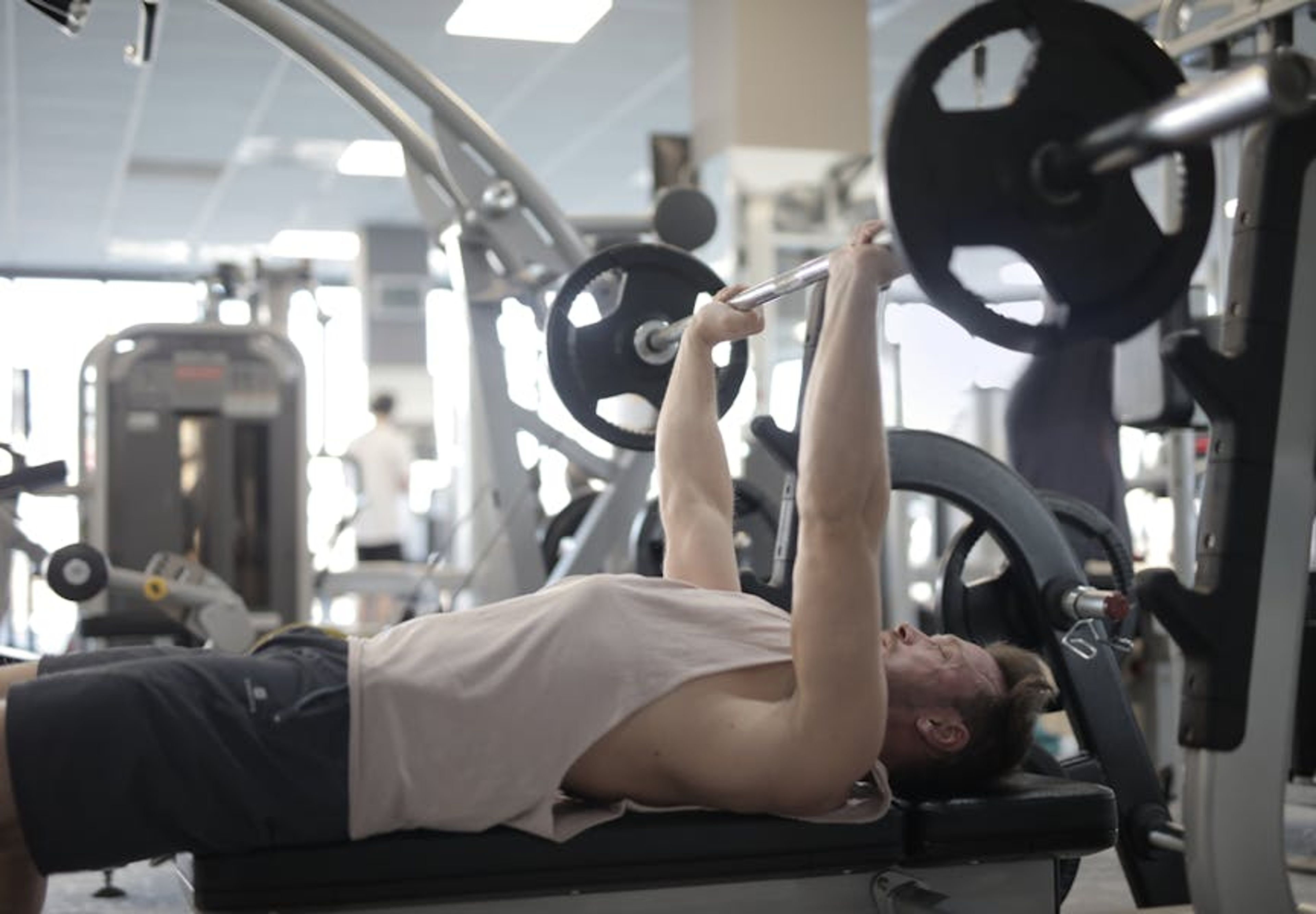 Athlete performing a barbell squat
