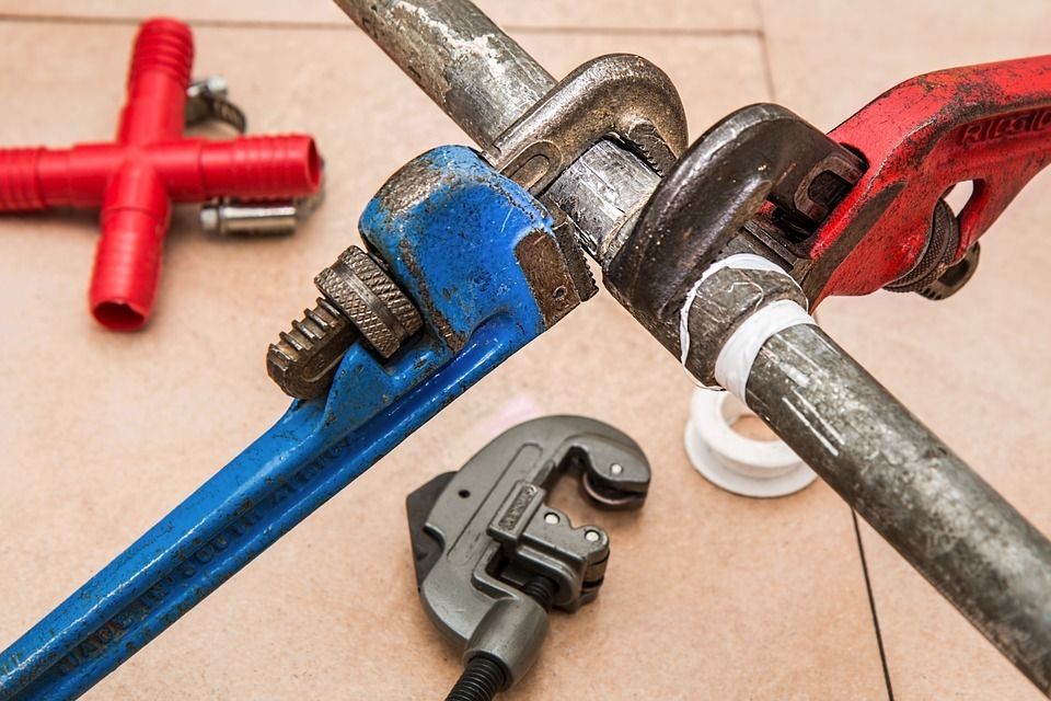 Emergency plumbing repair tools and plumbing materials.
