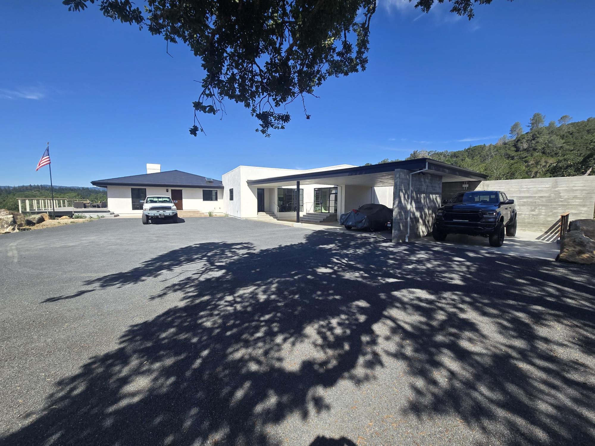 Greenfield Way St Helena exterior courtyard with trees and vehicles