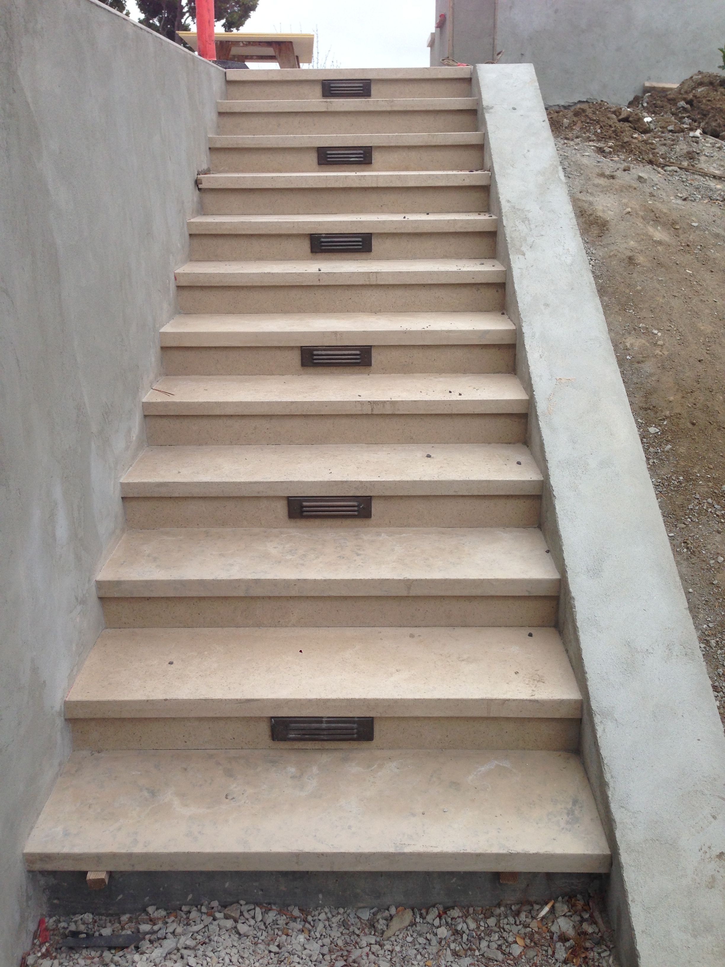 Custom concrete work by F H Landscaping, Inc.