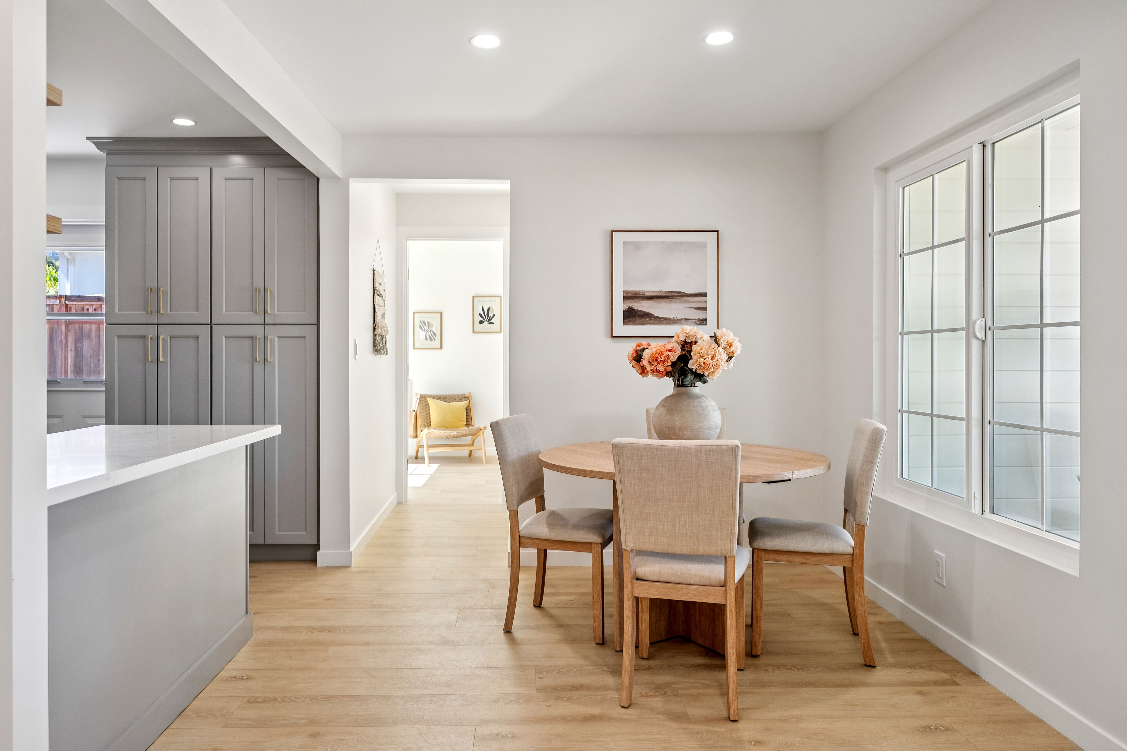 Bright open living space by Grace Morales Builders