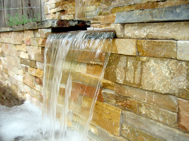 Landscape construction with lawn, paths and planting