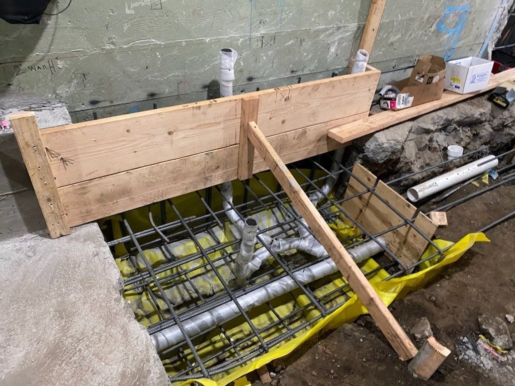 Radiant heating plumbing system