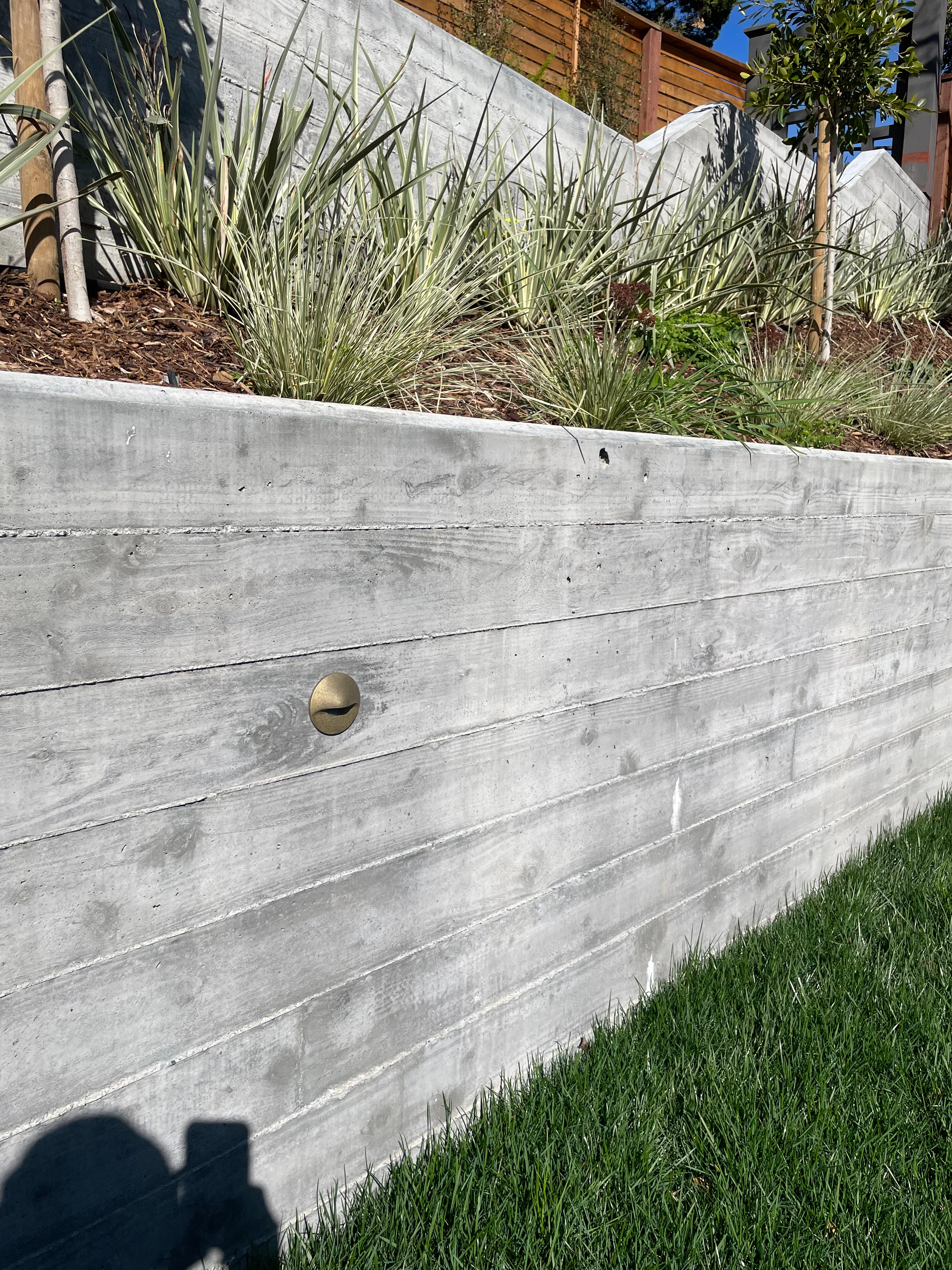 Retaining wall construction by F H Landscaping, Inc.