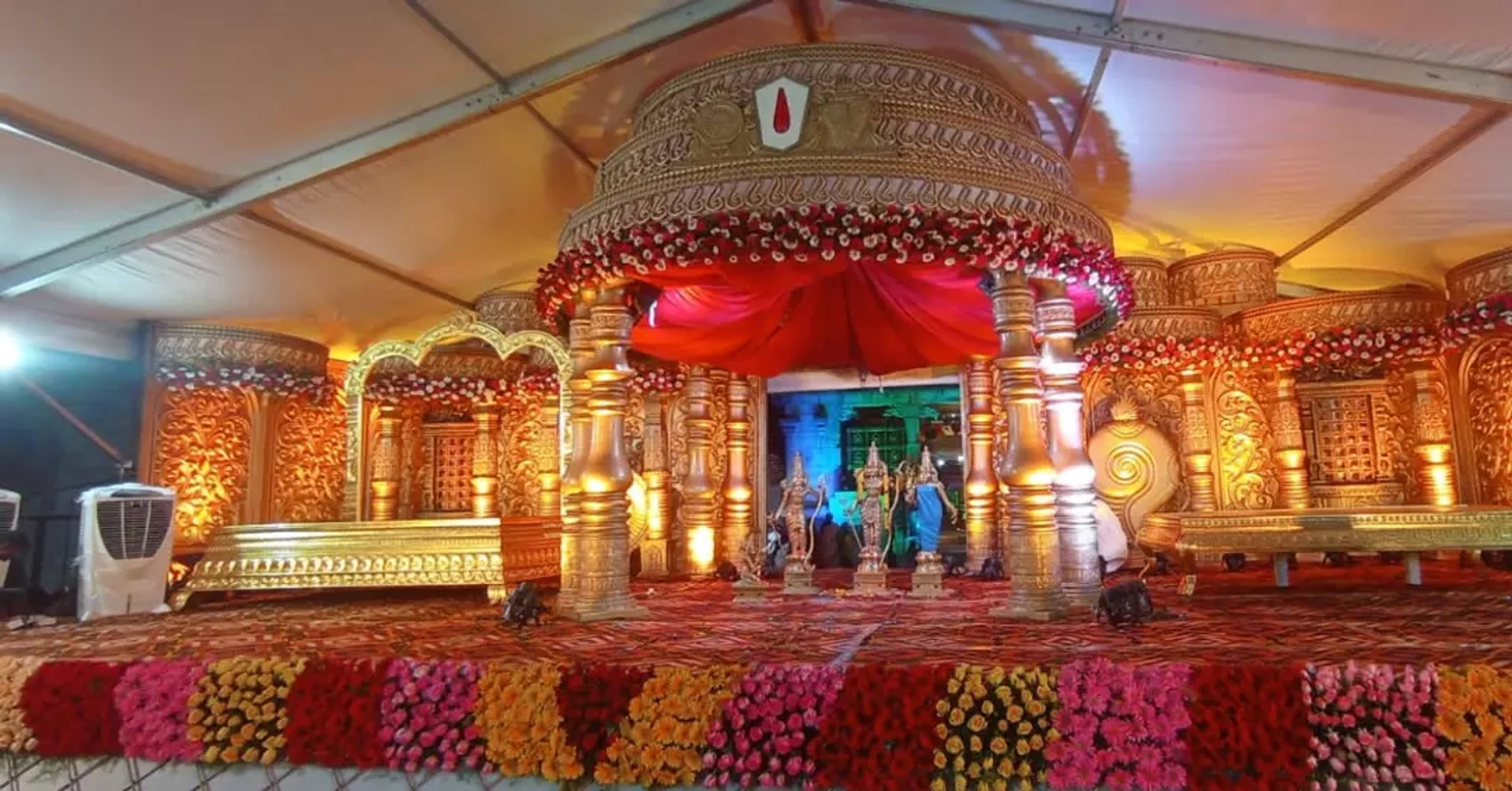 Gopuram-style mandap inside a tent pavilion