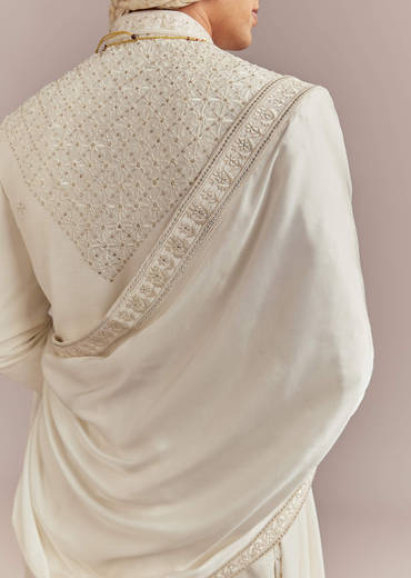 cream-silk-sherwani-for-groom-with-mughal-inspired-motifs-sg356093-1.jpg