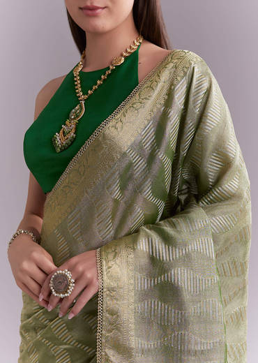 light-green-tissue-saree-with-subtle-weave-and-zari-border-sg351928-1.jpg