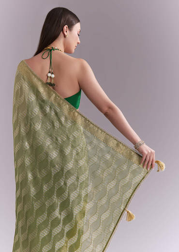 light-green-tissue-saree-with-subtle-weave-and-zari-border-sg351928-1.jpg