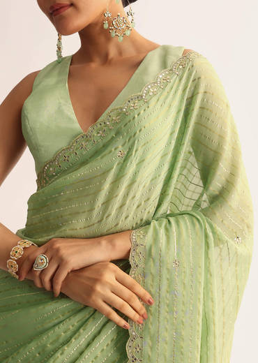 mint-green-scallop-bordered-saree-with-foil-printed-stripes-sg316268-1_21a46896-7675-46c0-9f56-0446ceee6214.jpg