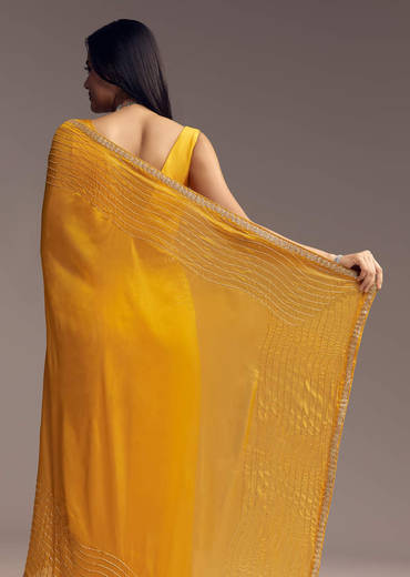 mustard-yellow-organza-saree-with-scallop-border-and-stone-work-sg317715-1_811c2b46-f61f-449d-80f1-72babc09d82f.jpg