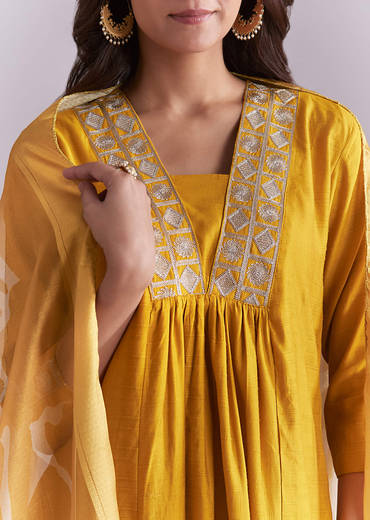 mustard-yellow-silk-anarkali-suit-with-zari-work-and-floral-print-dupatta-sg348414-1.jpg