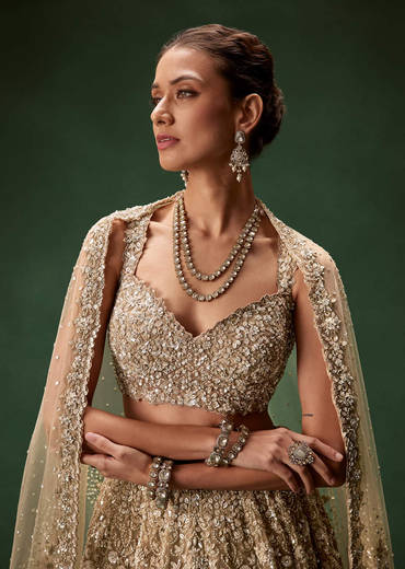 nude-bridal-lehenga-with-intricate-floral-sequin-and-beadwork-sg329476-1_8fd8f282-ab46-44f7-9546-0ee4d6627860.jpg