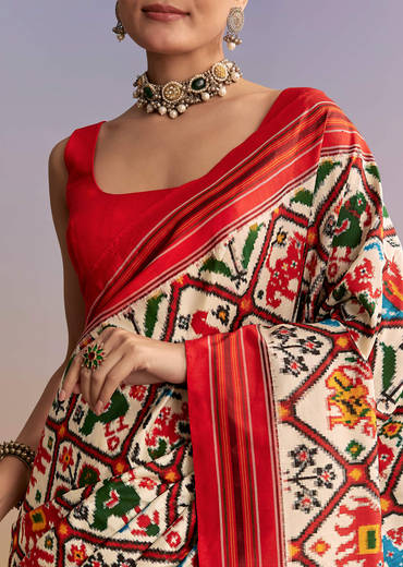 Off White And Ruby Red Double Ikkat Handwoven Patola Saree