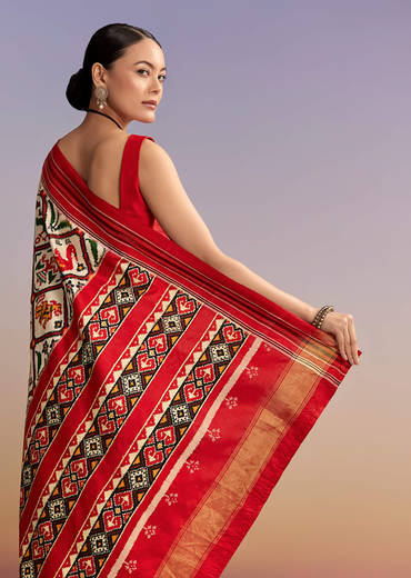 Off White And Ruby Red Double Ikkat Handwoven Patola Saree