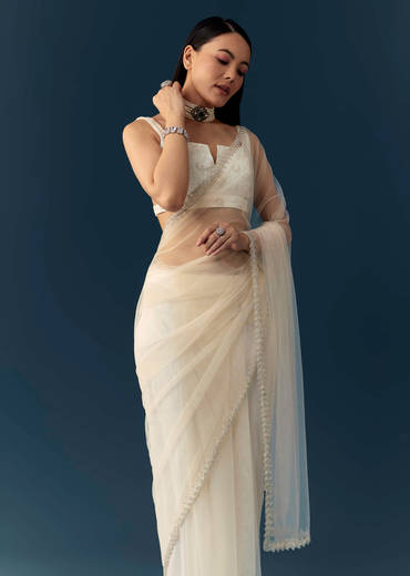 off-white-net-cutwork-border-saree-with-unstitched-blouse-sg339621-1.jpg