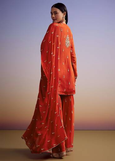 orange-chinon-sharara-suit-with-cut-dana-and-sequins-work-sg320632-1_2ddc1458-3a95-42eb-8c8b-9512a15e535e.jpg