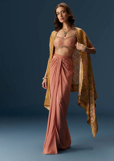 rusty-pink-embroidered-blouse-and-draped-skirt-set-with-embellished-cape-sg302764-1_035da857-cc73-4f88-8696-7fb9d54e39ad.jpg