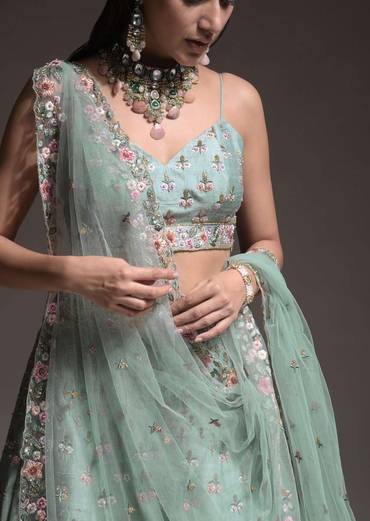 sage-green-lehenga-choli-in-raw-silk-with-vibrant-resham-embroidered-cluster-of-summer-blooms-and-buttis-online-kalki-fashion-606060_1_924b8bca-58b2-465d-aab8-6da71a973623.jpg
