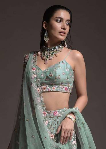 sage-green-lehenga-choli-in-raw-silk-with-vibrant-resham-embroidered-cluster-of-summer-blooms-and-buttis-online-kalki-fashion-606060_1_924b8bca-58b2-465d-aab8-6da71a973623.jpg