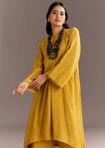 mustard-yellow-solid-kurta-palazzo-set-with-wooden-bib-neckpiece-sg312844-4_1b2ea927-b1ea-4110-9f8d-6f93f9271d2f.jpg