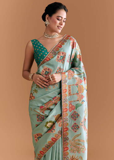 sky-blue-dola-silk-saree-with-madhubani-weave-and-embroidery-sg349809-1.jpg