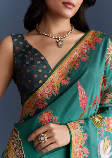 teal-blue-dola-silk-saree-with-nature-motifs-and-embroidery-sg349810-1.jpg