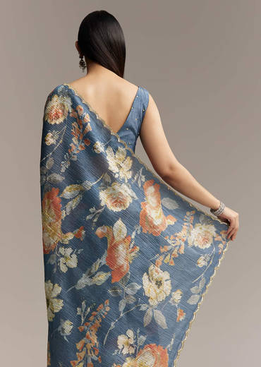 teal-blue-tissue-saree-with-floral-print-and-embroidered-border-sg319438-1.jpg