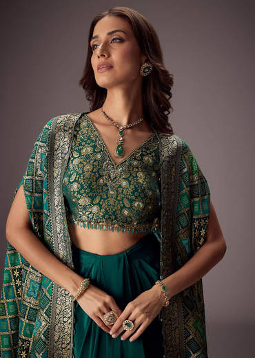 teal-green-draped-skirt-with-embroidered-blouse-and-tassel-cape-sg308562-1_434f176f-5f71-4720-91c2-5d4cefd5b43e.jpg