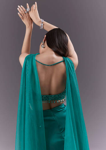 Teal Satin Crop Top And Drape Skirt Set With Heavy Embroidery