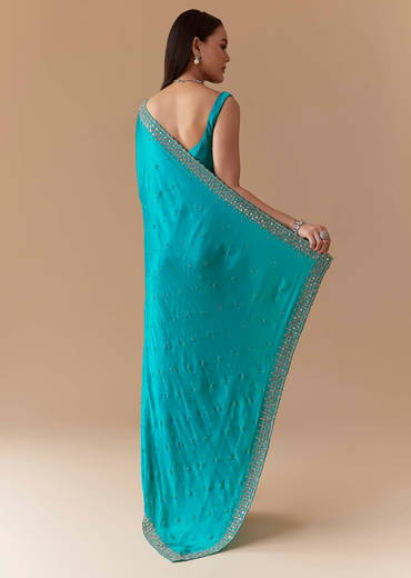 turquoise-blue-embellished-saree-with-unstitched-blouse-sg338748-1.jpg