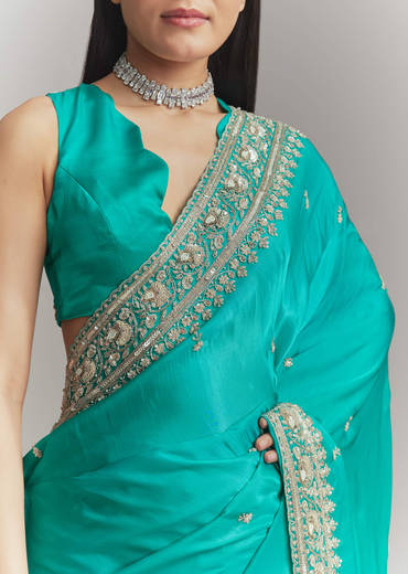 turquoise-blue-satin-embroidered-saree-with-heavy-hand-embroidery-sg338624-1.jpg