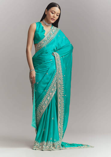 turquoise-blue-satin-embroidered-saree-with-heavy-hand-embroidery-sg338624-1.jpg