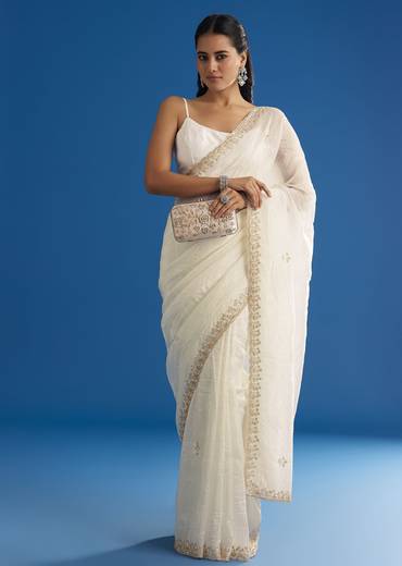 white-crushed-tissue-saree-with-stones-and-sequins-embroidery-and-scallop-border-sg296145-1_6995dc06-c2df-4093-b0d0-3eed0006324a.jpg