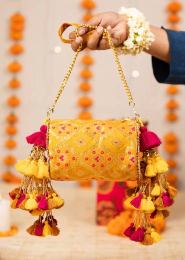 Yellow Brocade Zari Work Kundan Bag with Tassel