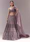 Purple Draped Blouse with Embellished Lehenga