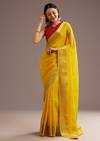 Mustard Yellow Crepe Silk Saree With Zari Border And Contrast Blouse