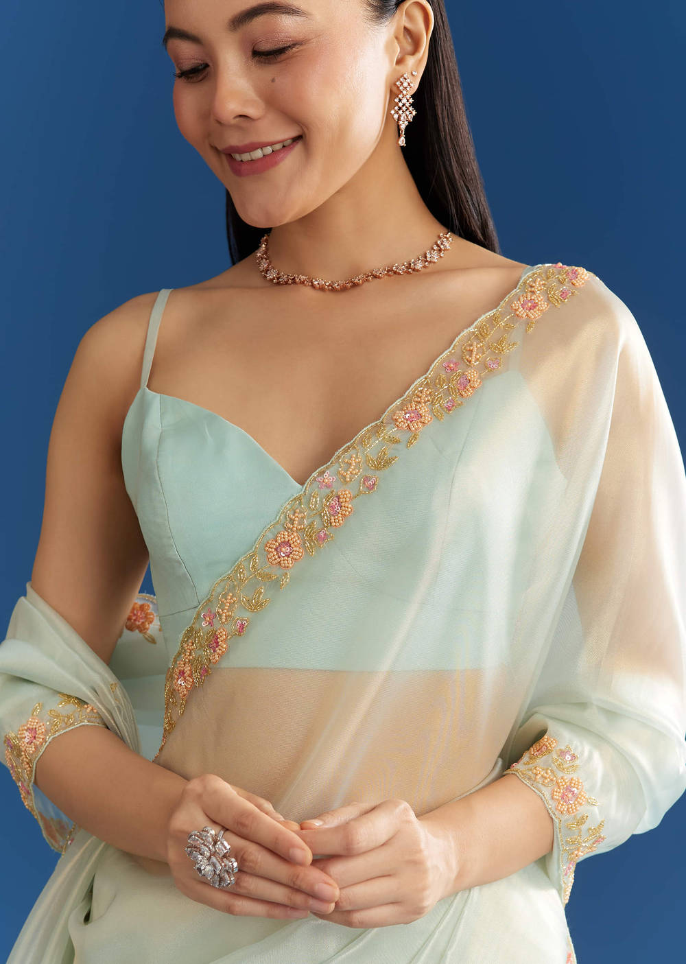 Aqua Blue Organza Tissue Saree With Multicolor Border