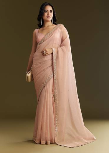 Beige Crushed Tissue Saree With Stone Embellishment And Glossy Finish