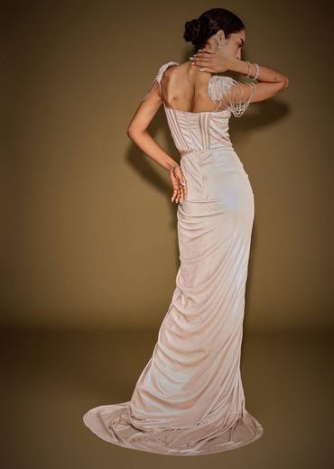 Champagne Drape Gown With Embroidered Shoulder Cape And Tassel Detailing