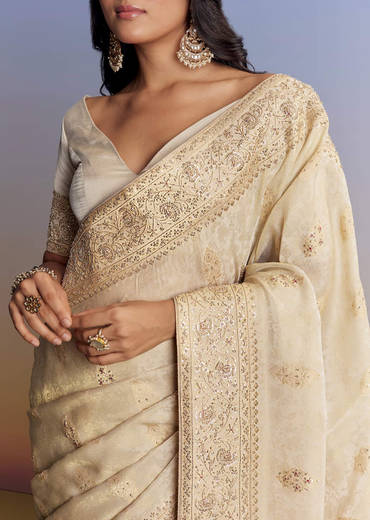 Cream Jacquard Silk Saree With Zari Brocade And Zardosi Embellished Pallu