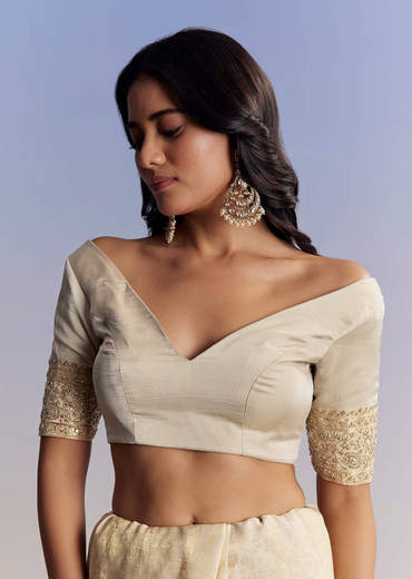 Cream Jacquard Silk Saree With Zari Brocade And Zardosi Embellished Pallu