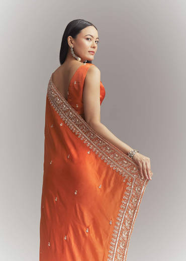 Dusky Orange Satin Embroidered Saree With Heavy Hand Embroidery