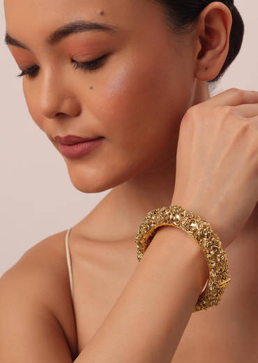 Gold Finish Temple Style Carved Bangle In Mix Metal