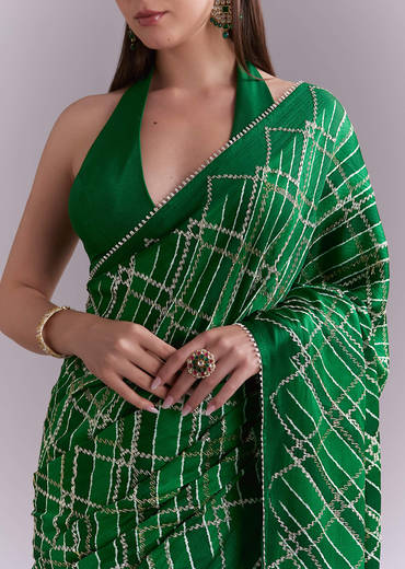 Green Satin Saree With Criss Cross Stripes And Zari Border