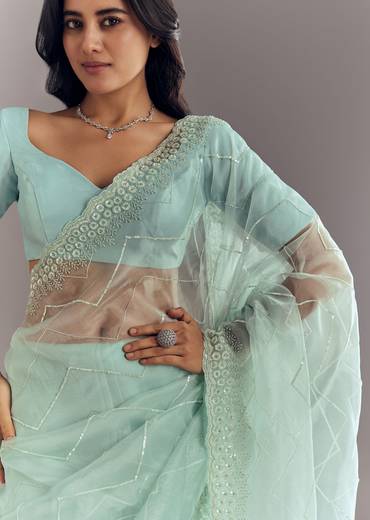 Light Blue Glass Tissue Saree With Stone Embroidery And Scallop Border