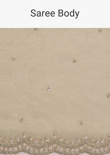 Light Green Glossy Crushed Tissue Saree With Cutdana Sequins Embroidery And Scallop Border