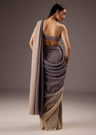 Lilac Purple Saree With Layered Blouse And Elegant Tassels